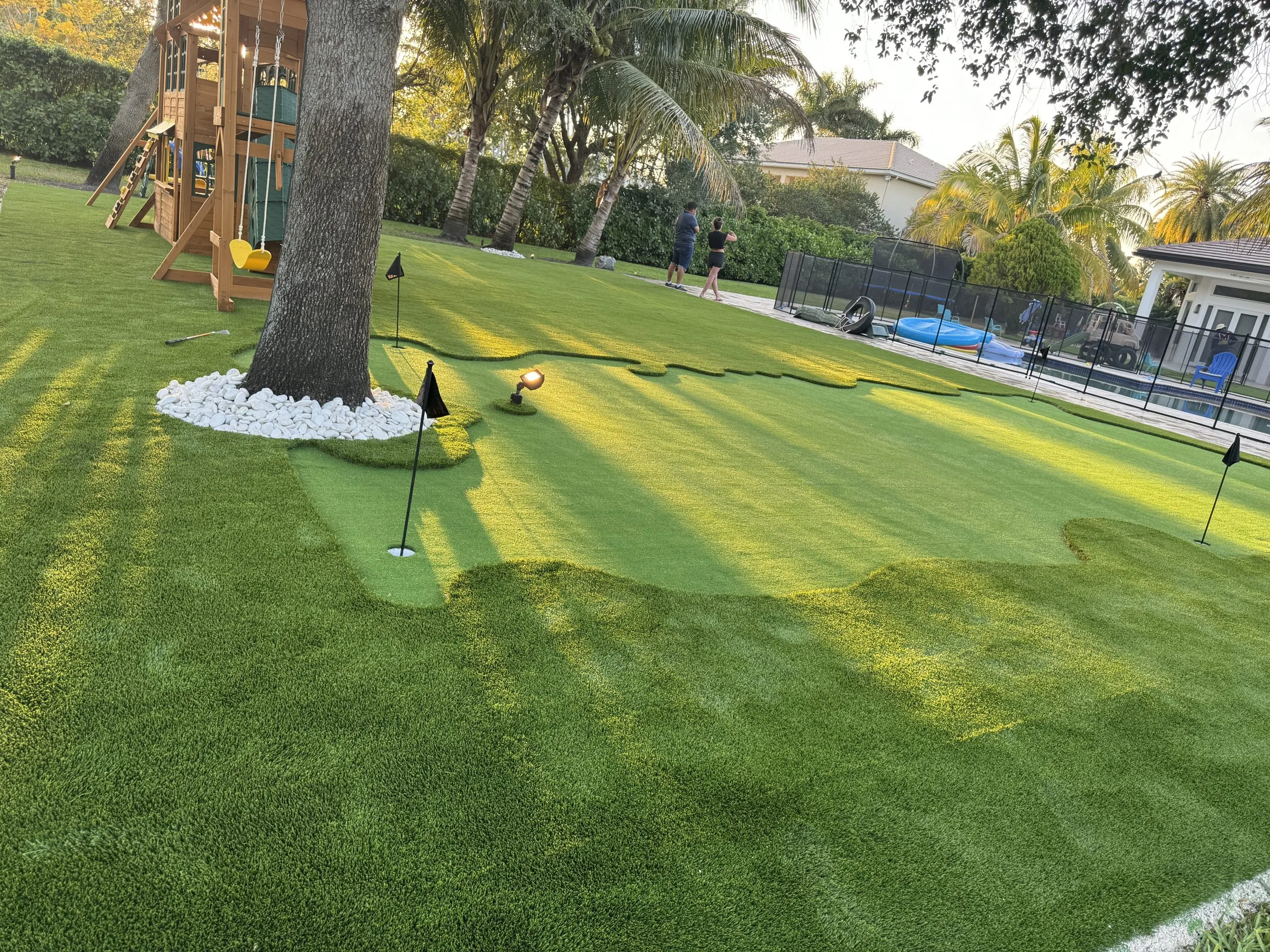 Lush artificial front lawn installed by Govorex in South Florida